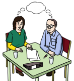 Leichte Sprache Bild: Zwei Personen sitzen an einem Tisch und denken gemeinsam nach