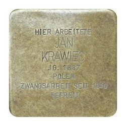 Stolperstein mit der Inschrift: Hier arbeitete Jan Krawiec, JG. 1887, Polen, Zwangsarbeit seit 1940, Befreit