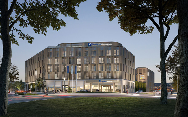 Das Monheimer Tor glich in seiner Höhe bislang eher einem etwas größeren Garagentor und wirkte allein zum Busbahnhof hin einladend. Der neue nördliche Anbau mit der hochwertigen und transparenten Fassade des Holiday Inn Express & Suites wird künftig hingegen auch ein echtes optisches Entree in die Monheimer Mitte bilden. Hier kommt man gerne an. Rechts im Hintergrund der ebenfalls neue nördliche Anbau, der sich zum Busbahnhof hin öffnet. Visualisierung: Heine Plan GmbH